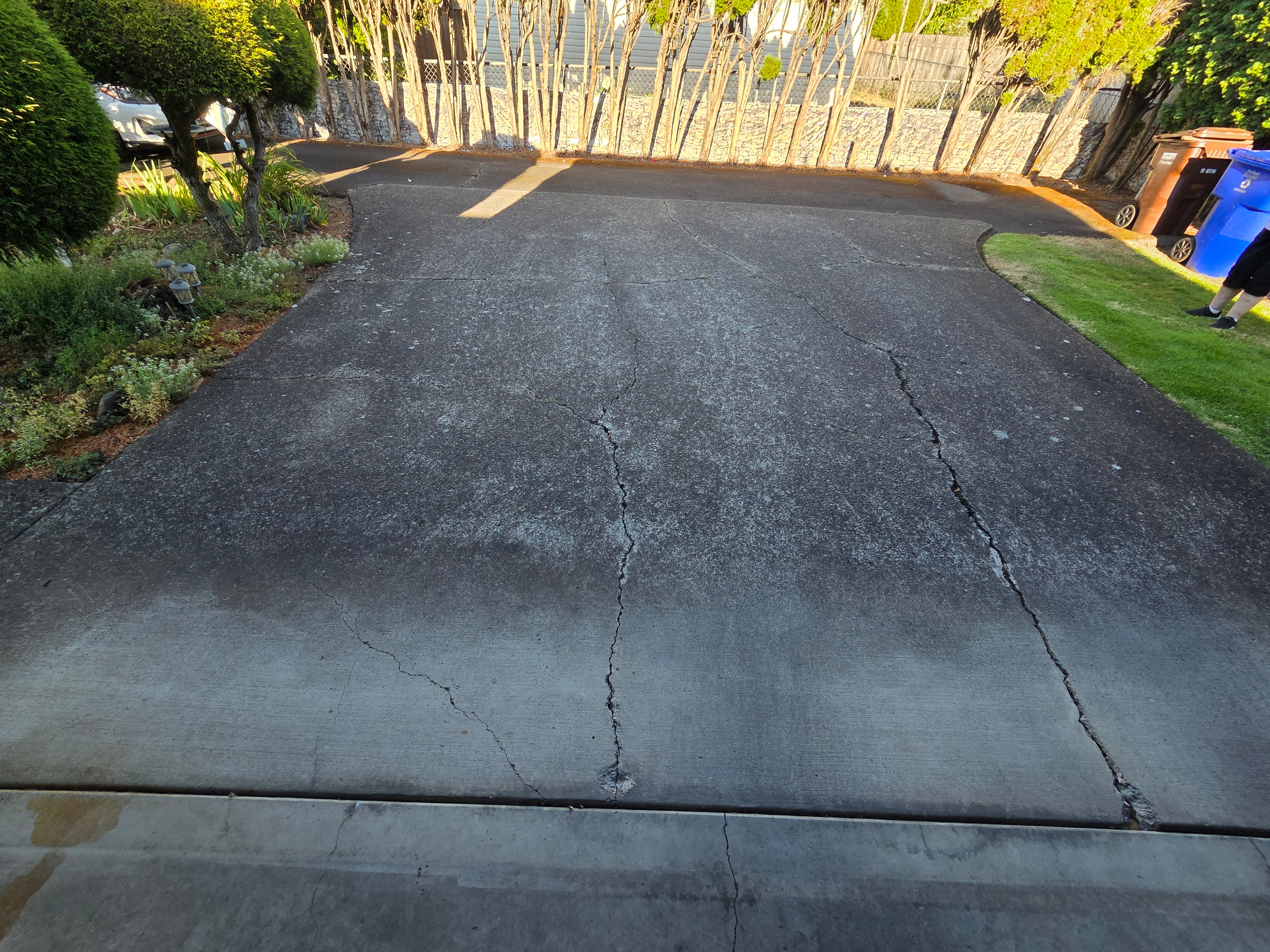 Original deteriorated concrete driveway Portland before removal