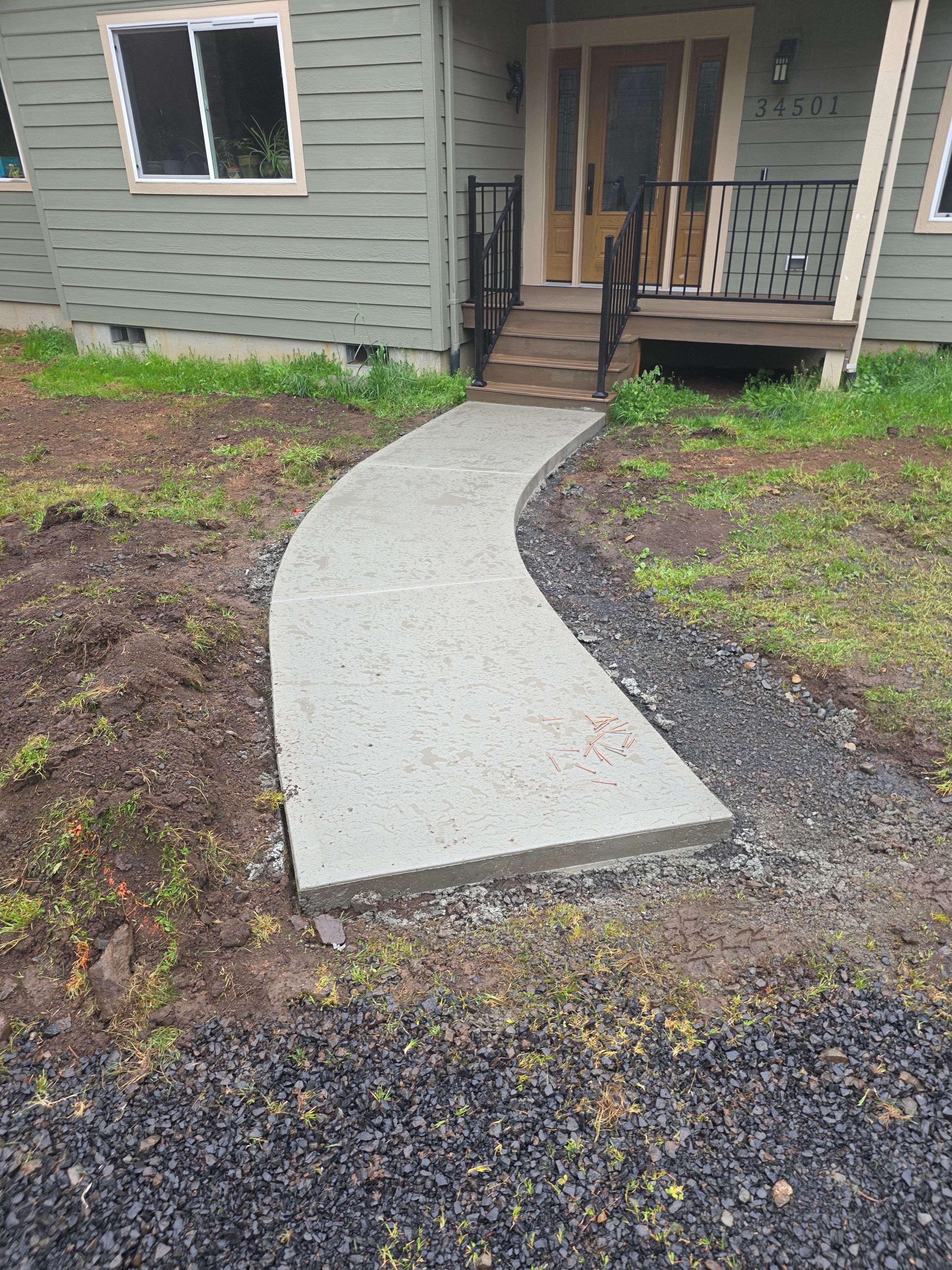 Front yard restored after French drain trench work